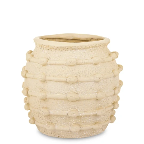 kremowa-oslonka-na-doniczke-boho-bobble.webp